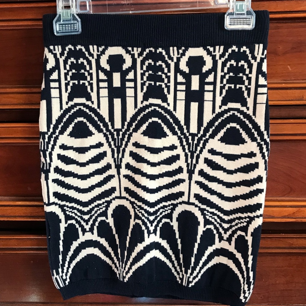 Navy and tan patterned cotton mini skirt. Size M.
